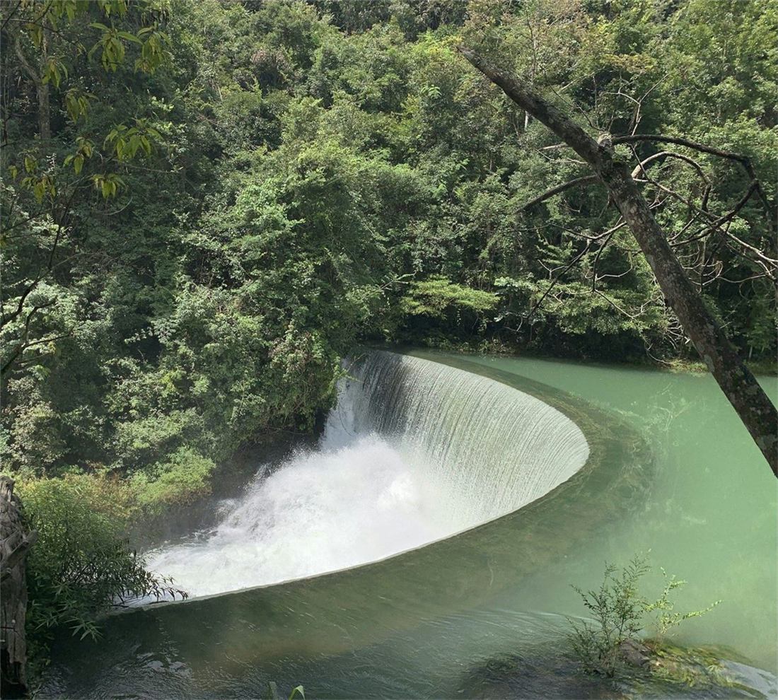 Libo karst forest and waterfall scenery in Guizhou.